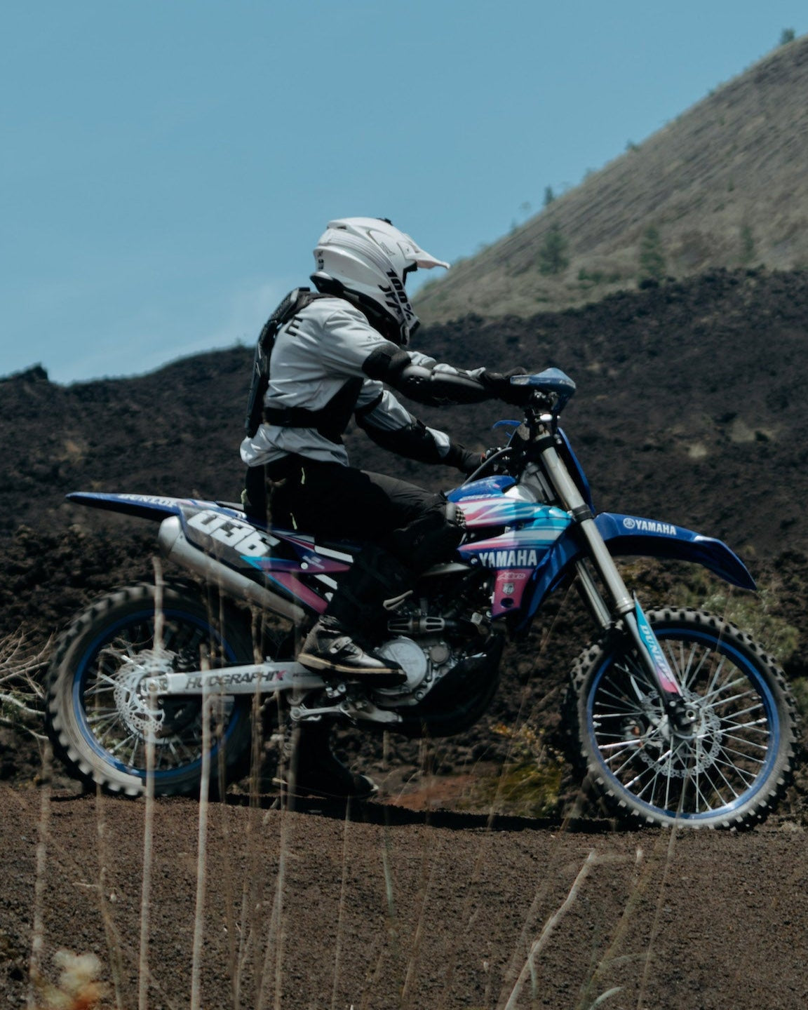 Rider on a YZ 250 next to the volcano in Bali